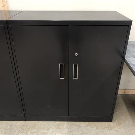 black and gray steel storage cabinet with doors|small grey cupboard with drawers.